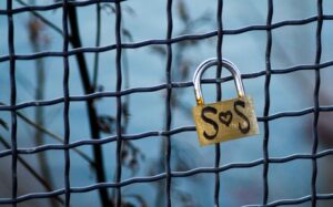 SOS lock on a fence