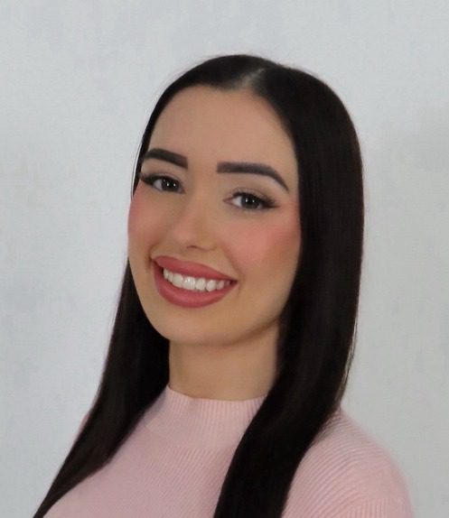 White woman with long dark hair